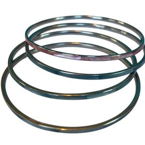 Four Silver Colored Metal Bangle Bracelets With Colored Inlay